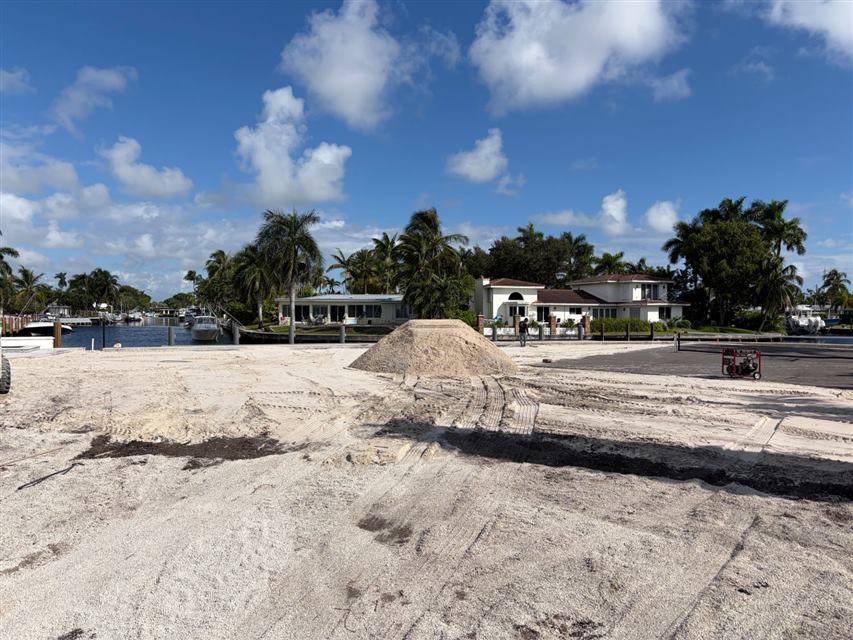 Sand delivered to a waterfront building lot