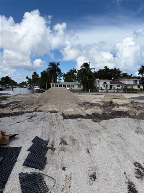 Sand delivered to a waterfront new-construction site